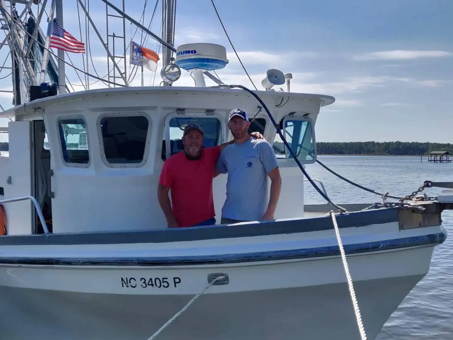 Two crew members aboard the R/V Carolina Coast before setting off on a Pamlico Sound Survey cruise. Joel Lauritsen, North Carolina Department of Environmental Quality.